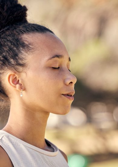 Woman, mediation and yoga with breathing, exercise and zen outdoor in a nature park in spring with .